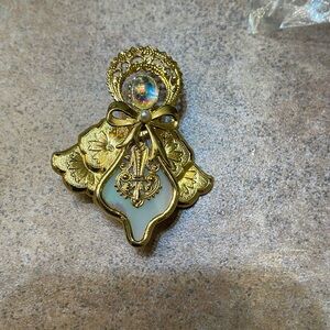 Gold tone angel brooch used